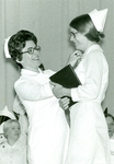 Josephine Ritz pins one of the graduates. by Lehigh Valley Health Network